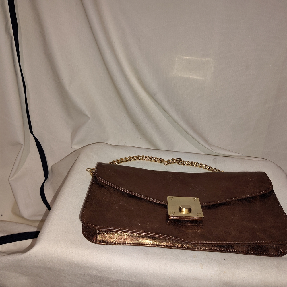 Kate Laundry copper tone purse, with gold chain strap, faux snake skin pattern